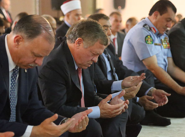 His Majesty King Abdullah performs Eid prayer at the Hashmiya Palace Mosque last Monday (Photo courtesy of Royal Court)
